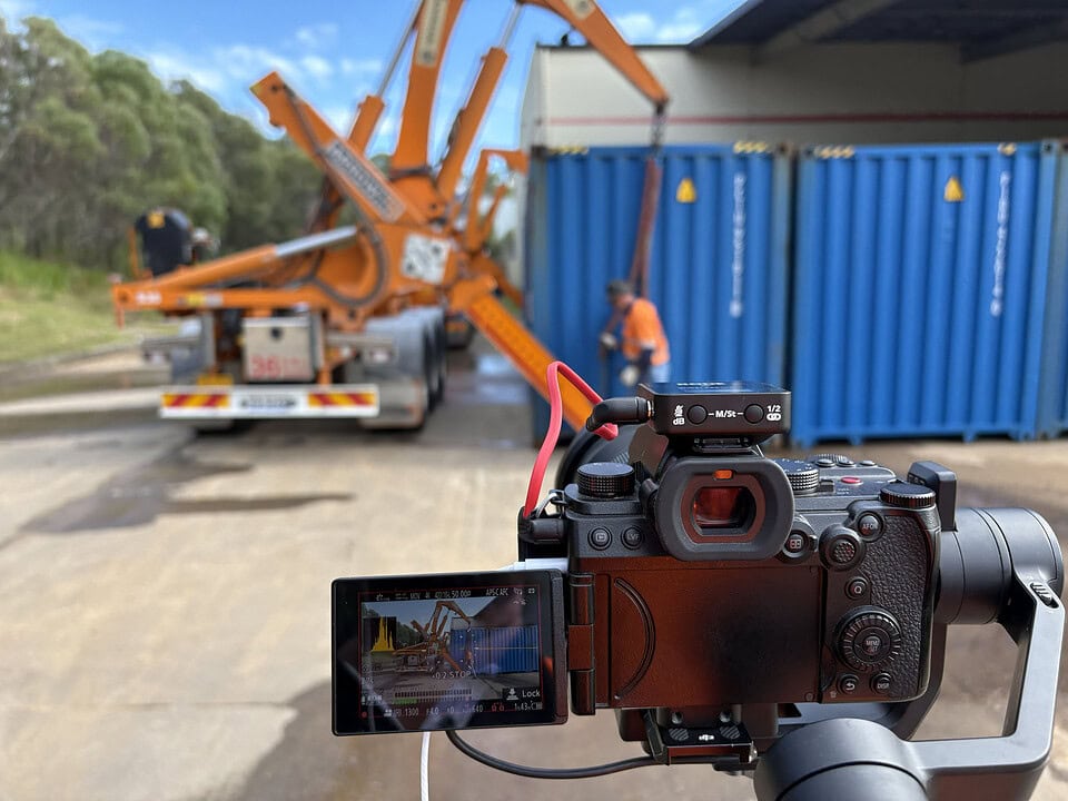 Videography Services Brisbane Professional camera filming industrial machinery at commercial construction site