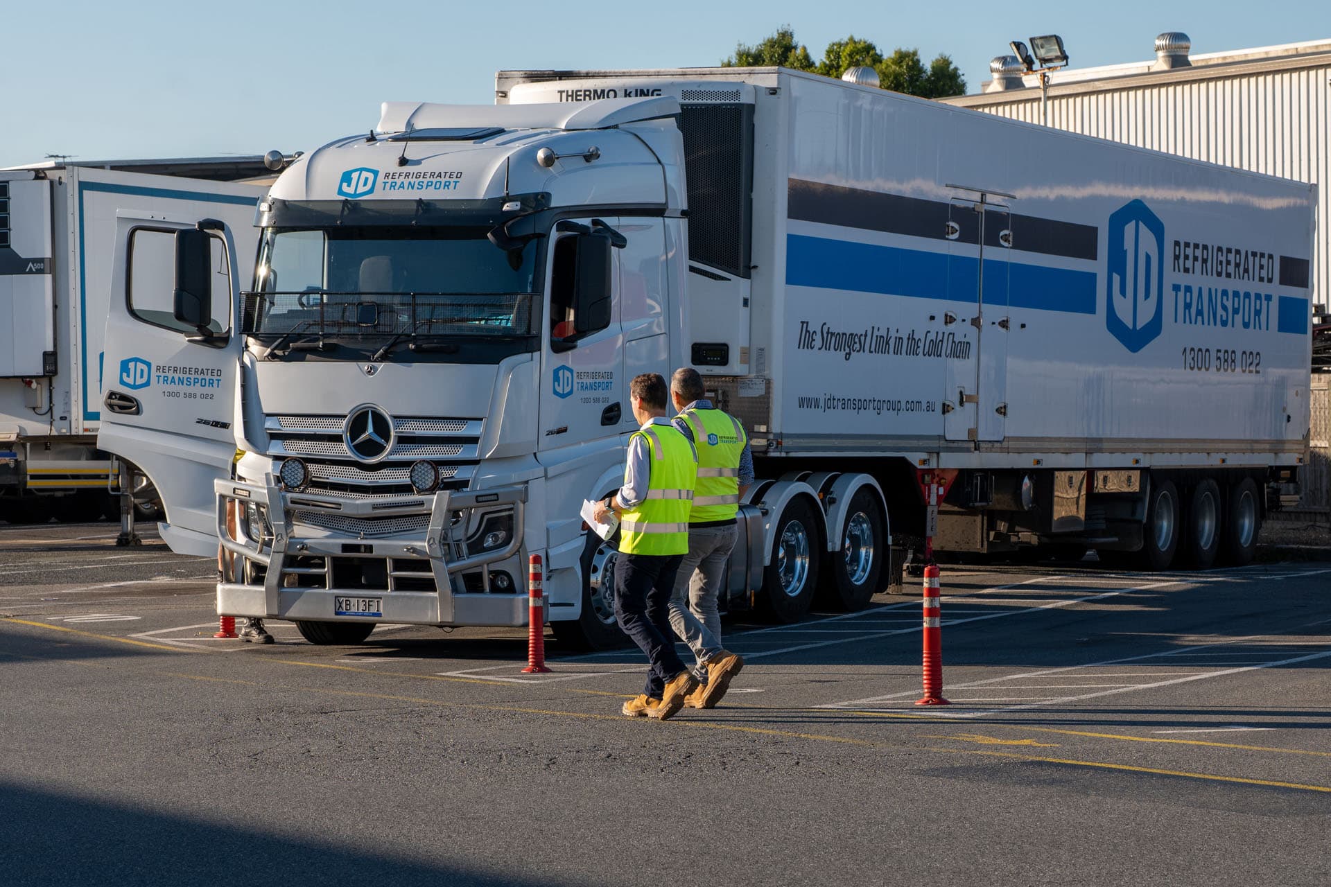 JD Transport truck at the Archerfield yard during corporate video production in Brisbane