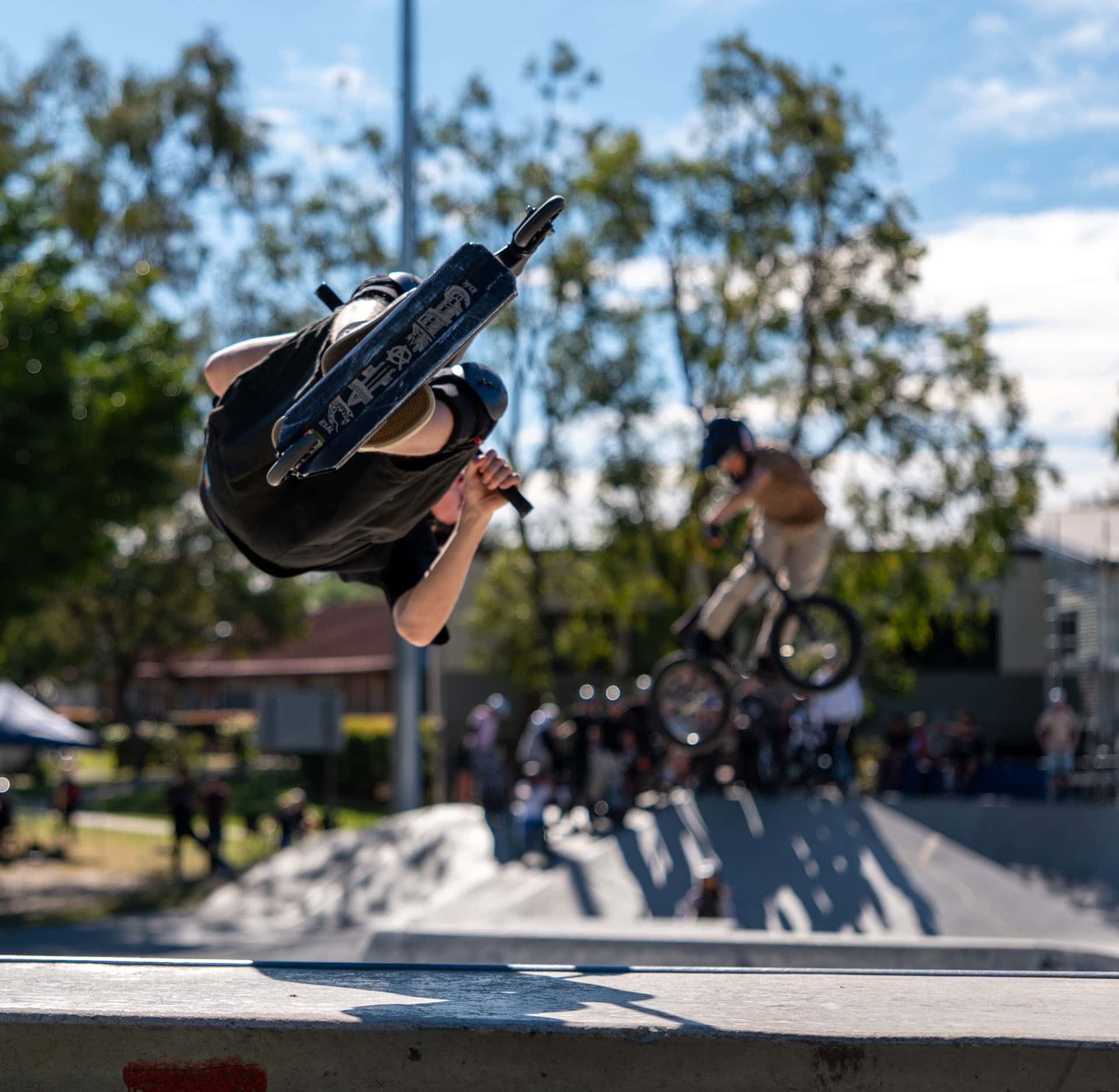 Action sports photography in Brisbane capturing a BMX rider performing a jump